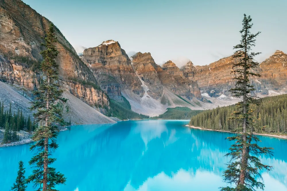 Blue waters of Moraine Lake beneath the Canadian Rockies